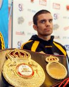 23 September 2009; The WBA World Super Bantamweight belt on the table in front of Bernard Dunne during the Brian Peters Promotions press conference ahead of the Hunky Dorys world title fight night on Saturday September 26th in the O2, Dublin, against and Poonsawat Kratingdaenggym, Thailand. Brian Peters Promotions press conference, Jimmy Chung's Bar & Buffet, Eden Quay, Dublin. Picture credit: Pat Murphy / SPORTSFILE