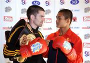 23 September 2009; WBA World Super Bantamweight Champion Bernard Dunne with Poonsawat Kratingdaenggym, Thailand, at the Brian Peters Promotions press conference ahead of the Hunky Dorys world title fight night on Saturday September 26th in the O2, Dublin. Brian Peters Promotions press conference, Jimmy Chung's Bar & Buffet, Eden Quay, Dublin. Picture credit: Pat Murphy / SPORTSFILE