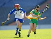 13 September 2009; Marion Crean, Offaly, is tackled by Gráinne Kenneally, Waterford. Gala All-Ireland Junior Camogie Championship Final, Offaly v Waterford, Croke Park, Dublin. Picture credit: Ray McManus / SPORTSFILE