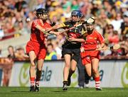 13 September 2009; Ann Dalton, Kilkenny, in action against Síle Burns, left, and Gemma O'Connor, Cork. Gala All-Ireland Senior Camogie Championship Final, Cork v Kilkenny, Croke Park, Dublin. Picture credit: Stephen McCarthy / SPORTSFILE