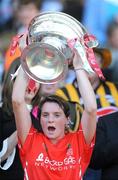 13 September 2009; Briege Corkery, Cork, lifts the O'Duffy cup. Gala All-Ireland Senior Camogie Championship Final, Cork v Kilkenny, Croke Park, Dublin. Picture credit: Stephen McCarthy / SPORTSFILE
