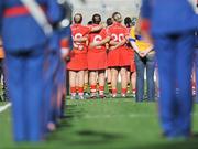 13 September 2009; Cork players stand for the national anthem. Gala All-Ireland Senior Camogie Championship Final, Cork v Kilkenny, Croke Park, Dublin. Picture credit: Brian Lawless / SPORTSFILE
