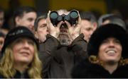 26 December 2015; A racegoer uses his binoculars to view a race at the Leopardstown Christmas Racing Festival, Leopardstown Racecourse, Dublin. Picture Credit: Ray McManus / SPORTSFILE