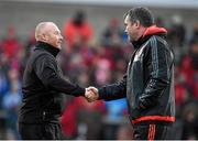 2 January 2016; Ulster head coach Neil Doak, left, shakes hands with Munster head coach Anthony Foley ahead of the game. Guinness PRO12, Round 11, Ulster v Munster. Kingspan Stadium, Ravenhill Park, Belfast. Picture credit: Ramsey Cardy / SPORTSFILE