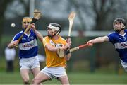 2 January 2016; Barry McFall, Antrim, in action against PJ Scully, right, and Ciaran Collier, Laois. Bord na Mona Walsh Cup, Group 2, Laois v Antrim. Kelly Heywood Community School, Ballinakill, Portlaoise , Co. Laois. Picture credit: Matt Browne / SPORTSFILE