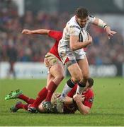 2 January 2016; Stuart McCloskey, Ulster, is tackled by Tomas O'Leary, Munster. Guinness PRO12, Round 11, Ulster v Munster. Kingspan Stadium, Ravenhill Park, Belfast. Picture credit: John Dickson / SPORTSFILE