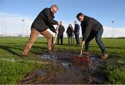 3 January 2016; John Byrne, left, and Bob Doheny clear up water from the goalmouth before the game. Bord na Mona O'Byrne Cup, Group B, Louth v Offaly, Darver Centre of Excellence, Dowdallshill, Co. Louth. Photo by Sportsfile