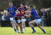 3 January 2016; Alan Stone, Westmeath, is tackled by Dean Healy, Wicklow . Bord na Mona O'Byrne Cup, Group D, Wicklow v Westmeath. Bray Emmetts, Bray, Co. Wicklow Picture credit: Ramsey Cardy / SPORTSFILE
