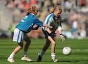 20 September 2009; Chloe Fox, Clongeen N.S., Clongeen, Co. Wexford, right, in action against Kaitlin Fleville, Tannaghmore P.S., Lurgan, Co. Armagh, left. Go Games during half time in the Armagh v Mayo match, Croke Park, Dublin. Picture credit: Pat Murphy / SPORTSFILE