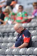 20 September 2009; A cork supporter reads his programme ahead of the game. GAA Football All-Ireland Senior Championship Final, Kerry v Cork, Croke Park, Dublin. Picture credit: Stephen McCarthy / SPORTSFILE