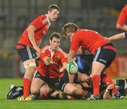 18 September 2009; David O'Driscoll, Munster, gets the ball away from the scrum watched by team-mates Brian Hayes, left, and Paddy Ryan. U20 Interprovincial, Munster v Leinster, Thomond Park, Limerick. Picture credit: Diarmuid Greene / SPORTSFILE