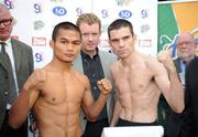 25 September 2009; WBA World Super Bantamweight Champion Bernard Dunne and Poonsawat Kratingdaenggym, of Thailand, with Promoter Brian Peters, during the Hunky Dorys World Title Fight Night Weigh-In ahead of their WBA World Super Bantamweight title fight in the O2 on Saturday night. Ballsbridge Inn Hotel, Ballsbridge, Dublin. Picture credit: Brian Lawless / SPORTSFILE