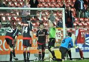 25 September 2009; Referee Tom Connolly shows the red card to Greg O'Halloran, third from left, Cork City for a handball on the goalline. League of Ireland Premier Division, St Patrick's Athletic v Cork City, Richmond Park, Dublin. Picture credit: David Maher / SPORTSFILE