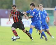 26 September 2009; Neale Fenn, Bohemians, is tackled by John Kearney, Waterford United. EA Sports Cup Final, Waterford United v Bohemians, RSC, Waterford. Picture credit: Matt Browne / SPORTSFILE