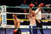 26 September 2009; Anthony Fitzgerald, right, celebrates beating Tadas Jonkus during their International Middleweight bout. Hunky Dorys Fight Night Undercard, The O2, Dublin. Picture credit: Stephen McCarthy / SPORTSFILE