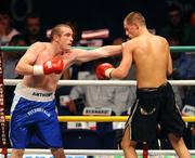 26 September 2009; Anthony Fitzgerald, left, in action against Tadas Jonkus during the third round of their International Middleweight bout. Hunky Dorys Fight Night Undercard, The O2, Dublin. Picture credit: Stephen McCarthy / SPORTSFILE