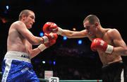 26 September 2009; Anthony Fitzgerald, left, in action against  Tadas Jonkus during their International Middleweight bout. Hunky Dorys Fight Night Undercard, The O2, Dublin. Picture credit: David Maher / SPORTSFILE
