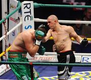 26 September 2009; Tomas Mrazek, right, exchanges punches with Tyson Fury during the first round of their International Heavyweight bout. Hunky Dorys Fight Night Undercard, The O2, Dublin. Picture credit: Stephen McCarthy / SPORTSFILE