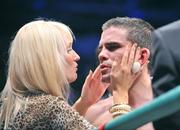 26 September 2009; Bernard Dunne is comforted by his wife Pamela after being defeated by Poonsawat Kratingdaenggym on the three knockdown rule after 2 minutes 57 seconds of the third round of their WBA World Super Bantamweight title fight. Hunky Dorys World Title Fight Night, Bernard Dunne v Poonsawat Kratingdaenggym, The O2, Dublin. Picture credit: David Maher / SPORTSFILE