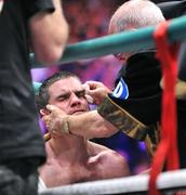 26 September 2009; Bernard Dunne is treated after being defeated by Poonsawat Kratingdaenggym on the three knockdown rule after 2 minutes 57 seconds of the third round of their WBA World Super Bantamweight title fight. Hunky Dorys World Title Fight Night, Bernard Dunne v Poonsawat Kratingdaenggym, The O2, Dublin. Picture credit: David Maher / SPORTSFILE