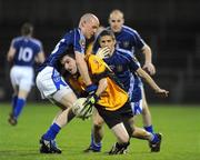 26 September 2009; Mark Graham, Portglenone Roger Casements, in action against Ciaran Gallagher, St. Gall's. Antrim Senior County Football Final, St. Gall's, Belfast v Portglenone Roger Casements, Casement Park, Belfast. Picture credit: Oliver McVeigh / SPORTSFILE