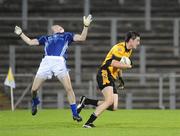 26 September 2009; Niall McKeever, Portglenone Roger Casements, in action against Ciaran Gallagher, St. Gall's. Antrim Senior County Football Final, St. Gall's, Belfast v Portglenone Roger Casements, Casement Park, Belfast. Picture credit: Oliver McVeigh / SPORTSFILE