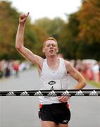 26 September 2009; Brian Maher, Kilkenny A.C., crosses the finish line to win the Lifestyle Sports - adidas Dublin Half Marathon. Phoenix Park, Dublin. Photo by Sportsfile