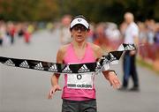26 September 2009; Annette Kealy, from Raheny Shamrocks, crosses the finish line to win the womens race in the Lifestyle Sports - adidas Dublin Half Marathon. Phoenix Park, Dublin. Photo by Sportsfile