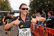 26 September 2009; Former Big Brother contestant Michelle Heaton celebrates after completing the Lifestyle Sports - adidas Dublin Half Marathon. Phoenix Park, Dublin. Photo by Sportsfile