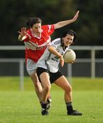 26 September 2009; Therese McNally, Emyvale, Co. Monaghan, in action against Fiona Courtney, Donaghmoyne, Co. Monaghan, during the Senior Championship Final. 2009 All-Ireland Ladies Football 7's, Naomh Mearnog, Portmarnock, Dublin. Picture credit: Brendan Moran / SPORTSFILE