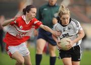 26 September 2009; Ciara McAnespie, Emyvale, Co. Monaghan, in action against Sharon Courtney, Donaghmoyne, Co. Monaghan, during the Senior Championship Final. 2009 All-Ireland Ladies Football 7's, Naomh Mearnog, Portmarnock, Dublin. Picture credit: Brendan Moran / SPORTSFILE