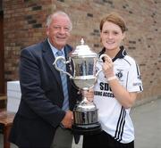 26 September 2009; Emyvale, Co. Monaghan, team captain Nicola Fahy is presented with the cup by Pat Quill, President, Cumann Peil Gael na mBan, after the Senior Championship Final. 2009 All-Ireland Ladies Football 7's, Naomh Mearnog, Portmarnock, Dublin. Picture credit: Brendan Moran / SPORTSFILE