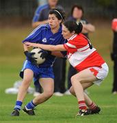 26 September 2009; Treasa McGrath, Ballymacarbry, Co. Waterford, in action against Fiona Courtney, Donaghmoyne, Co. Monaghan, during the Senior Championship semi-final. 2009 All-Ireland Ladies Football 7's, Naomh Mearnog, Portmarnock, Dublin. Picture credit: Brendan Moran / SPORTSFILE