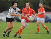 26 September 2009; Sinead McCleary, Clann Eireann, Co. Armagh, in action against Therese McNally, Emyvale, Co. Monaghan, during the Senior Championship semi-final. 2009 All-Ireland Ladies Football 7's, Naomh Mearnog, Portmarnock, Dublin. Picture credit: Brendan Moran / SPORTSFILE