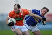 3 January 2016; Ciarán McKeever, Armagh, in action against Tom Hayes, Cavan. Bank of Ireland Dr. McKenna Cup, Group C, Round 1, Armagh v Cavan. St Oliver Plunkett Park, Crossmaglen, Co. Armagh. Picture credit: Stephen McCarthy / SPORTSFILE