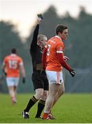 3 January 2016; Charlie Vernon, Armagh, receives a black card from referee Barry Cassidy. Bank of Ireland Dr. McKenna Cup, Group C, Round 1, Armagh v Cavan. St Oliver Plunkett Park, Crossmaglen, Co. Armagh. Picture credit: Stephen McCarthy / SPORTSFILE