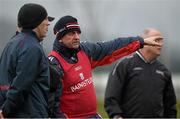 3 January 2016; New Cork manager Peadar Healy, centre, consults with his selectors Morgan O'SullEvan and Paudie Kissane during the game. McGrath Cup Football, Group B, Round 1, Cork v Limerick. Mallow GAA Grounds, Mallow, Co. Cork. Picture credit: Brendan Moran / SPORTSFILE