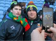 3 January 2016; Mayo supporter Jordan Kearns, from Castlebar, Co.Mayo, has his picture taken on a smartphone with Mayo manager Stephen Rochford at the end of the game. FBD Connacht League, Section A, Mayo v NUIG. Elverys MacHale Park, Castlebar, Co. Mayo. Picture credit: David Maher / SPORTSFILE
