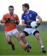 3 January 2016; Enda Henry, Cavan, in action against Ruairí McCaughley, Armagh. Bank of Ireland Dr. McKenna Cup, Group C, Round 1, Armagh v Cavan. St Oliver Plunkett Park, Crossmaglen, Co. Armagh. Picture credit: Stephen McCarthy / SPORTSFILE