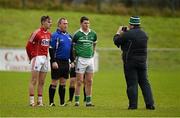 3 January 2016; Limerick Football Board PRO John O'Grady takes a photograph of team captains Daniel Goulding, left, Cork, and Ian Corbett, Limerick, in the company of referee Alan Kissane before the game. McGrath Cup Football, Group B, Round 1, Cork v Limerick. Mallow GAA Grounds, Mallow, Co. Cork. Picture credit: Brendan Moran / SPORTSFILE