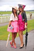 27 September 2009; Sisters Aoidin, left and Seana Sammon, from Kilcock, Co.Kildare, enjoying the racing at the Curragh Racecourse. Curragh Racecourse, Co. Kildare. Picture credit: David Maher / SPORTSFILE
