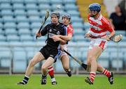 27 September 2009; Tadhg Og Murphy, Sarsfields, in action against Eoin Clancy and Eoin Dillon, right, CIT. Cork County Senior Hurling Semi-Final, Sarsfields v CIT, Páirc Uí Chaoimh, Cork. Picture credit: Brian Lawless / SPORTSFILE