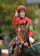 27 September 2009; Jockey Richard Hughes, on his mount, Lucky General, celebrates after winning the Goffs Million Sprint. Curragh Racecourse, Co. Kildare. Picture credit: David Maher / SPORTSFILE