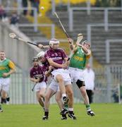 27 September 2009; Eamon Lavery and Conor Carson Cushendall Ruairí Óg, in action against Gregory O'Kane, Dunloy. Antrim County Senior Hurling Final, Cushendall Ruairí Óg v Dunloy, Casement Park, Belfast. Picture credit: Oliver McVeigh / SPORTSFILE