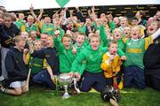 27 September 2009; Dunloy players and young fans, celebrate with the Volunteer cup. Antrim County Senior Hurling Final, Cushendall Ruairí Óg v Dunloy, Casement Park, Belfast. Picture credit: Oliver McVeigh / SPORTSFILE