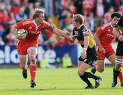 27 September 2009; Jean de Villiers, Munster, is tackled by Wayne Evans, Newport Gwent Dragons. Celtic League, Munster v Newport Gwent Dragons, Musgrave Park, Cork. Picture credit: Matt Browne / SPORTSFILE