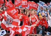 27 September 2009; Cork supporters cheer on their side during the TG4 All-Ireland Ladies Football Senior Championship Final. TG4 All-Ireland Ladies Football Championship Finals, Croke Park, Dublin. Picture credit: Brendan Moran / SPORTSFILE
