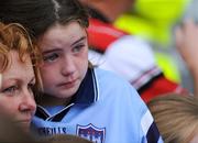 27 September 2009; A tearful young Dublin supporter watches the presentation of the trophy after the TG4 All-Ireland Ladies Football Senior Championship Final. TG4 All-Ireland Ladies Football Championship Finals, Croke Park, Dublin. Picture credit: Brendan Moran / SPORTSFILE