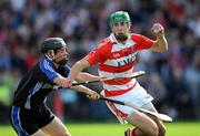 27 September 2009; Brian Corry, CIT, in action against Conor O'Sullivan, Sarsfields. Cork County Senior Hurling Semi-Final, Sarsfields v CIT, Páirc Uí Chaoimh, Cork. Picture credit: Brian Lawless / SPORTSFILE