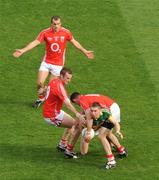 20 September 2009; Marc O Se, Kerry, is surrounded by Cork players John Miskella, Alan O'Connor, left, and Donnacha O'Connor. GAA Football All-Ireland Senior Championship Final, Kerry v Cork, Croke Park, Dublin. Picture credit: Ray McManus / SPORTSFILE